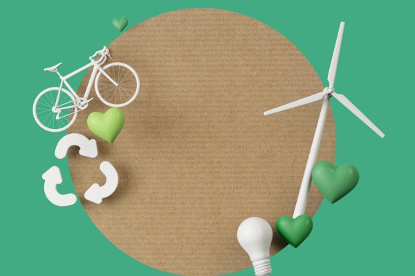 段ボールの地球、自転車、リサイクルマーク、風力発電機、グリーンの歯^と、サステナブルイメージ