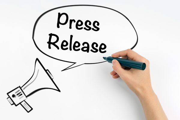 Hand drawing a speech bubble reading 'Press Release' beside a megaphone graphic
プレスリリースのイラストを描く手、プレスリリースのイメージイラスト